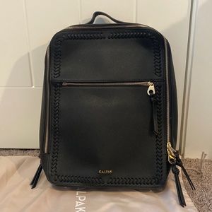 Never been used calpack backpack with dust bag.